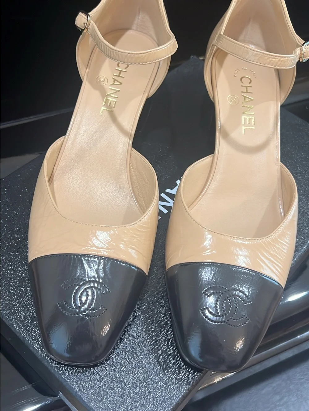 CHANEL Beige and Black Cap-Toe Slingback Heels